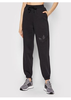 adidas Spodnie dresowe HE4750 Czarny Loose Fit ze sklepu MODIVO w kategorii Spodnie damskie - zdjęcie 134375784