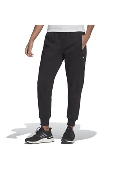 Spodnie dresowe adidas Sportswear Studio Lounge Fleece HE0421 - czarne ze sklepu streetstyle24.pl w kategorii Spodnie damskie - zdjęcie 134590924