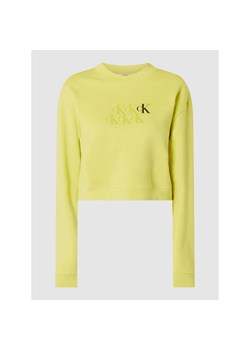 Żółta bluza damska Calvin Klein z napisami krótka casualowa 