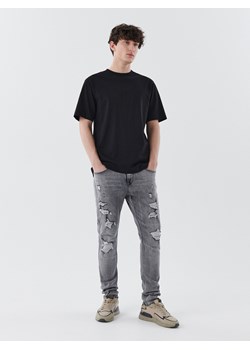 Cropp - Szare jeansy skinny - jasny szary ze sklepu Cropp w kategorii Jeansy męskie - zdjęcie 137203660