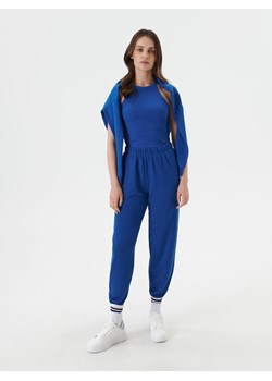Sinsay - Spodnie dresowe - Niebieski ze sklepu Sinsay w kategorii Spodnie damskie - zdjęcie 141965704