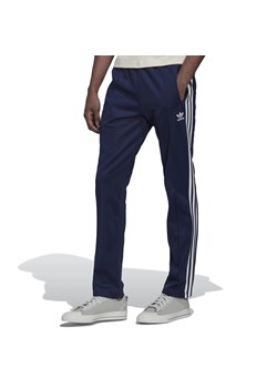 Spodnie dresowe adidas Originals Adicolor Classic Beckenbauer Primeblue Track HK7372 - granatowe ze sklepu streetstyle24.pl w kategorii Spodnie męskie - zdjęcie 141981232