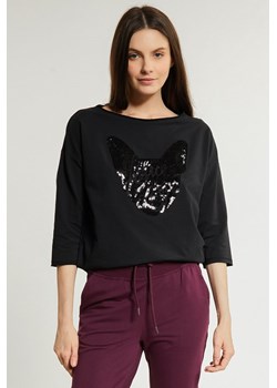 Czarna bluza z cekinową aplikacją ze sklepu MONNARI w kategorii Bluzy damskie - zdjęcie 142623904