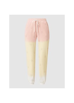 Spodnie dresowe ze wzorem Smiley® ze sklepu Peek&Cloppenburg  w kategorii Spodnie damskie - zdjęcie 142661260