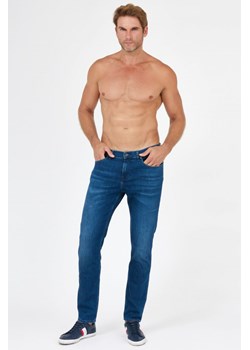 7 FOR ALL MANKIND - Granatowe jeansy męskie SLIMMY TAPERED LUXE PERFORMANCE ECO ze sklepu outfit.pl w kategorii Jeansy męskie - zdjęcie 143751261