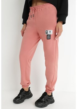 Ciemnoróżowe Spodnie Dresowe Theliore ze sklepu Born2be Odzież w kategorii Spodnie damskie - zdjęcie 144727991