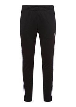adidas Originals Spodnie dresowe Mężczyźni Sztuczne włókno czarny jednolity ze sklepu vangraaf w kategorii Spodnie męskie - zdjęcie 146515640