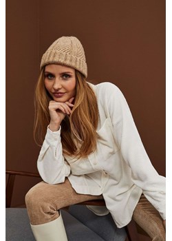 Dzianinowa czapka brązowa ze sklepu Moodo.pl w kategorii Czapki zimowe damskie - zdjęcie 146649620