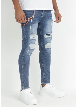 Niebieskie Jeansy Slim z Dziurami i Dekoracyjnym Sznurkiem z Karabińczykiem Azzie ze sklepu Born2be Odzież w kategorii Jeansy męskie - zdjęcie 149402592