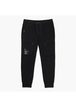 Cropp - Czarne jeansy jogger z kieszeniami cargo - czarny ze sklepu Cropp w kategorii Spodnie męskie - zdjęcie 149465994