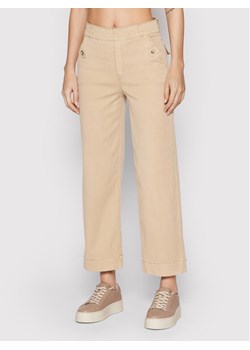SPANX Spodnie materiałowe Cropped 20312R Beżowy Regular Fit ze sklepu MODIVO w kategorii Spodnie damskie - zdjęcie 150343922