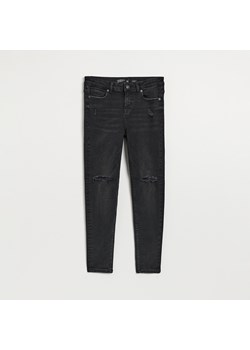 Czarne jeansy skinny fit z regularnym stanem - Czarny ze sklepu House w kategorii Jeansy damskie - zdjęcie 152421194