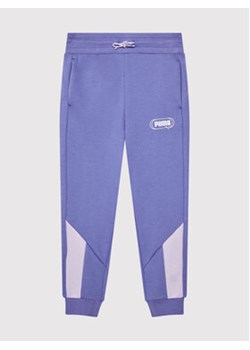 Puma Spodnie dresowe Rebel 586160 Fioletowy Regular Fit ze sklepu MODIVO w kategorii Spodnie dziewczęce - zdjęcie 152503542