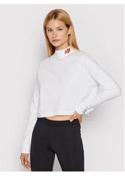 Nike Bluzka Sportswear DB9735 Biały Loose Fit ze sklepu MODIVO w kategorii Bluzki damskie - zdjęcie 152528072