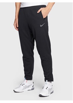 Nike Spodnie dresowe Pro DM5886 Czarny Regular Fit ze sklepu MODIVO w kategorii Spodnie męskie - zdjęcie 152533244