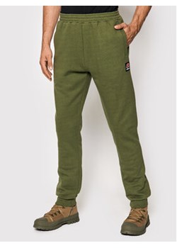 Ellesse Spodnie dresowe Eques SHK12206 Zielony Regular Fit ze sklepu MODIVO w kategorii Spodnie męskie - zdjęcie 152576094