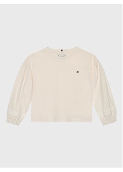 Tommy Hilfiger Bluzka KG0KG07051 D Beżowy Regular Fit ze sklepu MODIVO w kategorii Bluzki dziewczęce - zdjęcie 152589904