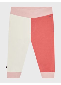 Tommy Hilfiger Spodnie dresowe Logo Colorblock KN0KN01516 Różowy Regular Fit ze sklepu MODIVO w kategorii Spodnie i półśpiochy - zdjęcie 152626932