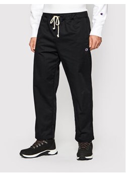Champion Spodnie materiałowe 216544 Czarny Regular Fit ze sklepu MODIVO w kategorii Spodnie męskie - zdjęcie 152646123