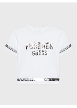 Guess T-Shirt J3RI19 K6YW1 Biały Regular Fit ze sklepu MODIVO w kategorii Bluzki dziewczęce - zdjęcie 152665623
