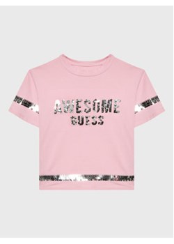 Guess T-Shirt J3RI19 K6YW1 Różowy Regular Fit ze sklepu MODIVO w kategorii Bluzki dziewczęce - zdjęcie 152666620