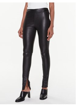 Calvin Klein Spodnie skórzane K20K205363 Czarny Slim Fit ze sklepu MODIVO w kategorii Spodnie damskie - zdjęcie 152945034