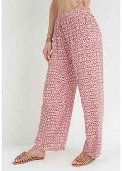 Różowe Szerokie Spodnie z Gumką w Talii i Regularnym Stanem z Wiskozy Timandia ze sklepu Born2be Odzież w kategorii Spodnie damskie - zdjęcie 153023000