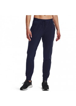 Damskie spodnie treningowe Under Armour UA Armour Sport Woven Pant - granatowe ze sklepu Sportstylestory.com w kategorii Spodnie damskie - zdjęcie 153035852