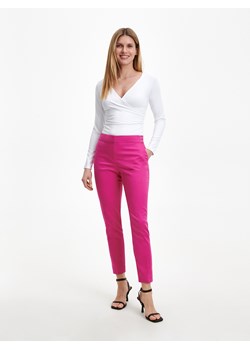 Reserved - Spodnie z kantem - Różowy ze sklepu Reserved w kategorii Spodnie damskie - zdjęcie 153062463