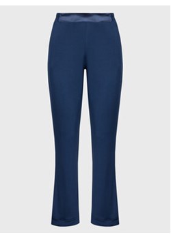 Femilet by Chantelle Spodnie piżamowe FNB060 Granatowy Regular Fit ze sklepu MODIVO w kategorii Piżamy damskie - zdjęcie 153379943