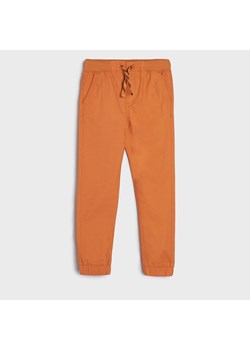 Sinsay - Jeansy jogger - Pomarańczowy ze sklepu Sinsay w kategorii Spodnie chłopięce - zdjęcie 154100792