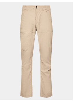 Peak Performance Spodnie outdoor Iconiq G79120030 Beżowy Regular Fit ze sklepu MODIVO w kategorii Spodnie męskie - zdjęcie 155791121