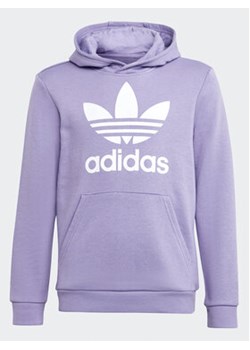 adidas Bluza Trefoil Hoodie IB9983 Fioletowy Regular Fit ze sklepu MODIVO w kategorii Bluzy dziewczęce - zdjęcie 155809831