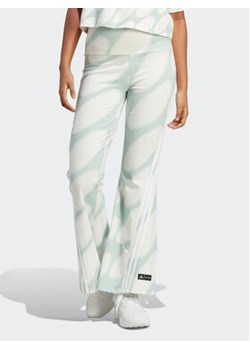 adidas Legginsy adidas x Marimekko Future Icons Flared Leggings HR8186 Biały ze sklepu MODIVO w kategorii Spodnie damskie - zdjęcie 156051843