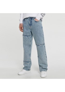 Cropp - Jasne jeansy wide leg - Niebieski ze sklepu Cropp w kategorii Jeansy męskie - zdjęcie 156856361