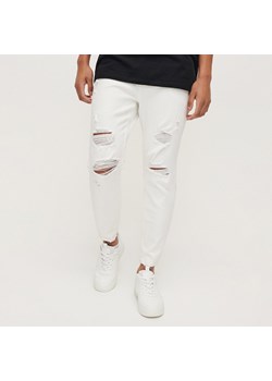 Białe jeansy slim fit z przetarciami - Biały ze sklepu House w kategorii Jeansy męskie - zdjęcie 156859913
