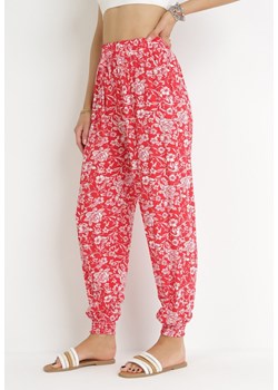 Czerwone Spodnie z Gumką w Pasie z Wiskozy w Kwiaty Totsu ze sklepu Born2be Odzież w kategorii Spodnie damskie - zdjęcie 156899343