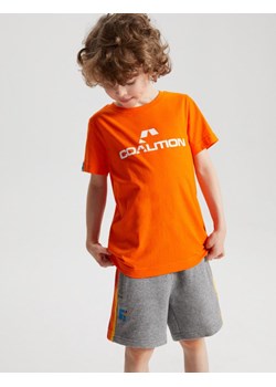 Koszulka CLTN K LOGO 123 Neon Pomarańcz 122-128 ze sklepu Diverse w kategorii T-shirty chłopięce - zdjęcie 157130351