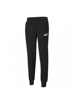 Męskie spodnie dresowe PUMA ESS LOGO PANTS FL ze sklepu Sportstylestory.com w kategorii Spodnie męskie - zdjęcie 157226782