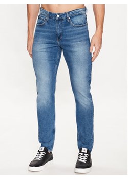 Calvin Klein Jeans Jeansy J30J323367 Granatowy Slim Taper Fit ze sklepu MODIVO w kategorii Jeansy męskie - zdjęcie 157312291