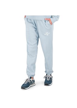Spodnie New Balance WP31508LAY - niebieskie ze sklepu streetstyle24.pl w kategorii Spodnie damskie - zdjęcie 157461284