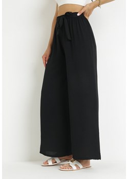 Czarne Szerokie Spodnie z Materiałowym Paskiem i Gumką w Talii Dellisa ze sklepu Born2be Odzież w kategorii Spodnie damskie - zdjęcie 159178504