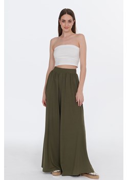 Szerokie spodnie Olive Garden XS/S ze sklepu NAOKO w kategorii Spodnie damskie - zdjęcie 160208011