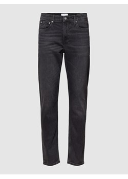 Jeansy o kroju slim fit z detalami z logo ze sklepu Peek&Cloppenburg  w kategorii Jeansy męskie - zdjęcie 160548024