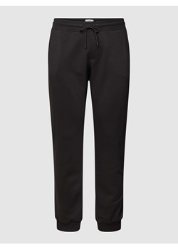Spodnie dresowe z wpuszczanymi kieszeniami ze sklepu Peek&Cloppenburg  w kategorii Spodnie męskie - zdjęcie 160691011