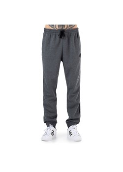 Spodnie adidas Essentials Fleece Tapered Cuff 3-Stripes GK8826 - szare ze sklepu streetstyle24.pl w kategorii Spodnie męskie - zdjęcie 160907894