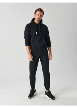 Sinsay - Spodnie dresowe jogger - czarny ze sklepu Sinsay w kategorii Spodnie męskie - zdjęcie 161210294