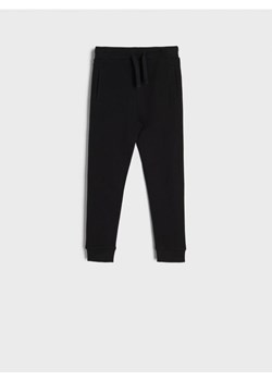 Sinsay - Spodnie dresowe jogger - czarny ze sklepu Sinsay w kategorii Spodnie chłopięce - zdjęcie 161212072
