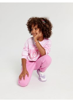 Sinsay - Spodnie dresowe jogger - różowy ze sklepu Sinsay w kategorii Spodnie dziewczęce - zdjęcie 161213530