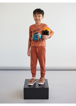 Sinsay - Spodnie dresowe jogger - pomarańczowy ze sklepu Sinsay w kategorii Spodnie chłopięce - zdjęcie 161215200